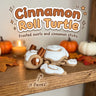 Cinnamon Roll Turtle 3D printed articulated flexi toy by Cosmic 3D Creations, on a cozy autumn shelf with pumpkins