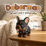 Doberman 3D printed articulated flexi toy by Cosmic 3D Creations, on a cozy side table with a knit blanket