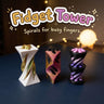 Fidget Tower 3D printed spiral fidget toys by Cosmic 3D Creations, on a navy desk with a globe lamp