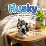 Husky 3D printed articulated flexi toy by Cosmic 3D Creations, on a cozy side table with a knit blanket