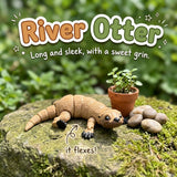 River Otter 3D printed articulated flexi toy by Cosmic 3D Creations, on a mossy stone with plants