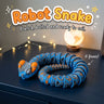 Robot Snake 3D printed articulated flexi toy by Cosmic 3D Creations, on a desk with star lights