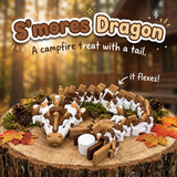 S'mores Dragon 3D printed articulated flexi toy by Cosmic 3D Creations, on a tree stump with moss and pine cones