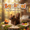 Squirrel 3D printed articulated flexi toy by Cosmic 3D Creations, on a tree stump with moss and pine cones